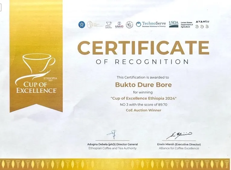 Cup of Excellence Ethiopia 2024 certificate — Bukto Dure Bore, no. 3, score 89.70, CoE Auction Winner.